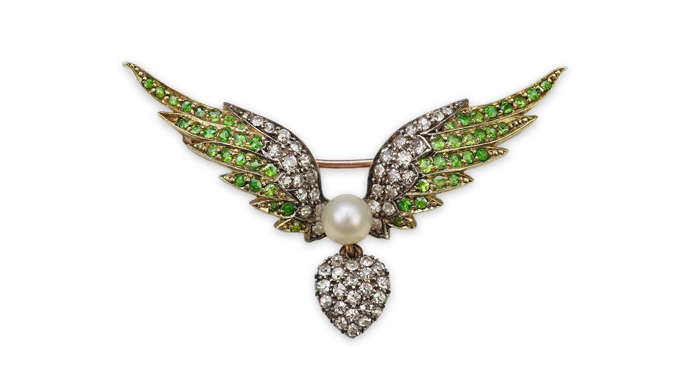 An attractive late Victorian demantoid garnet, pearl and diamond brooch, circa 1900
